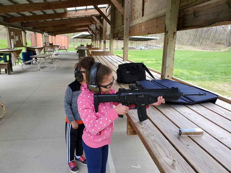 Children learning to shoot firearms safely and legally